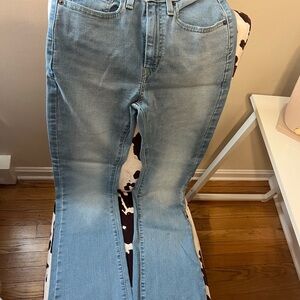 High-rise boot cut Levi’s 27 inch waist very stretchy never worn